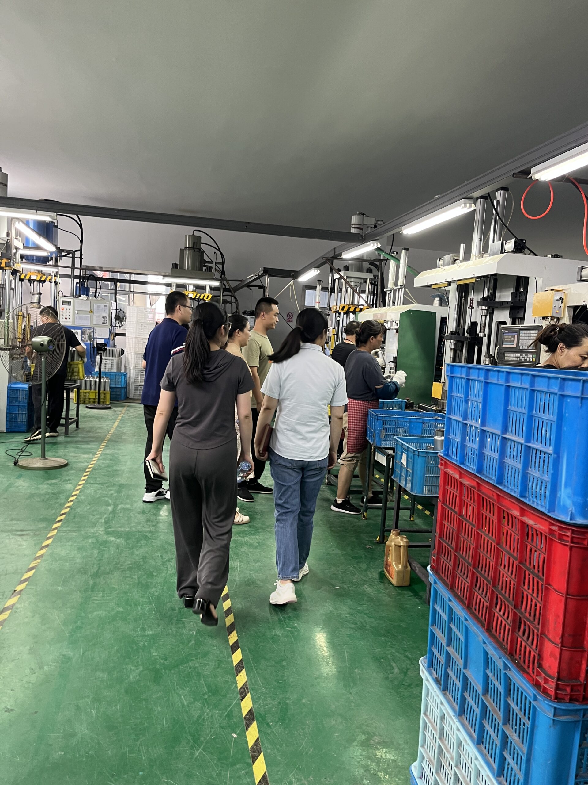 Documentary record of customer visit to thermos cup factory